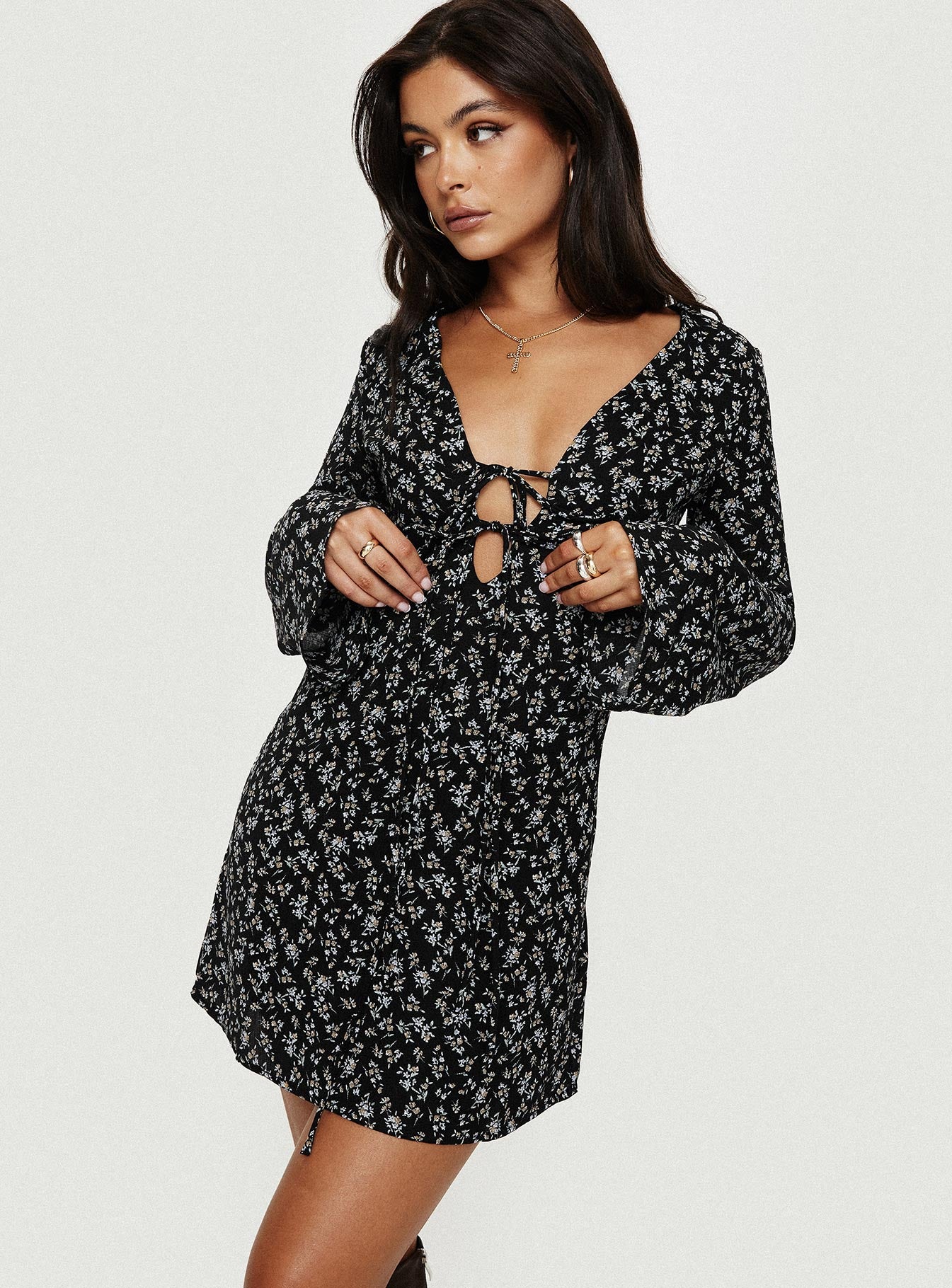 Front view of model wearing  front Princess Polly Asymmetric Neckline  Malop Long Sleeve Mini Dress Black Floral