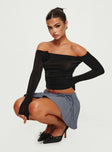 Off the shoulder long sleeve top  Rosette detail, ruching at sides, elasticated around neckline 