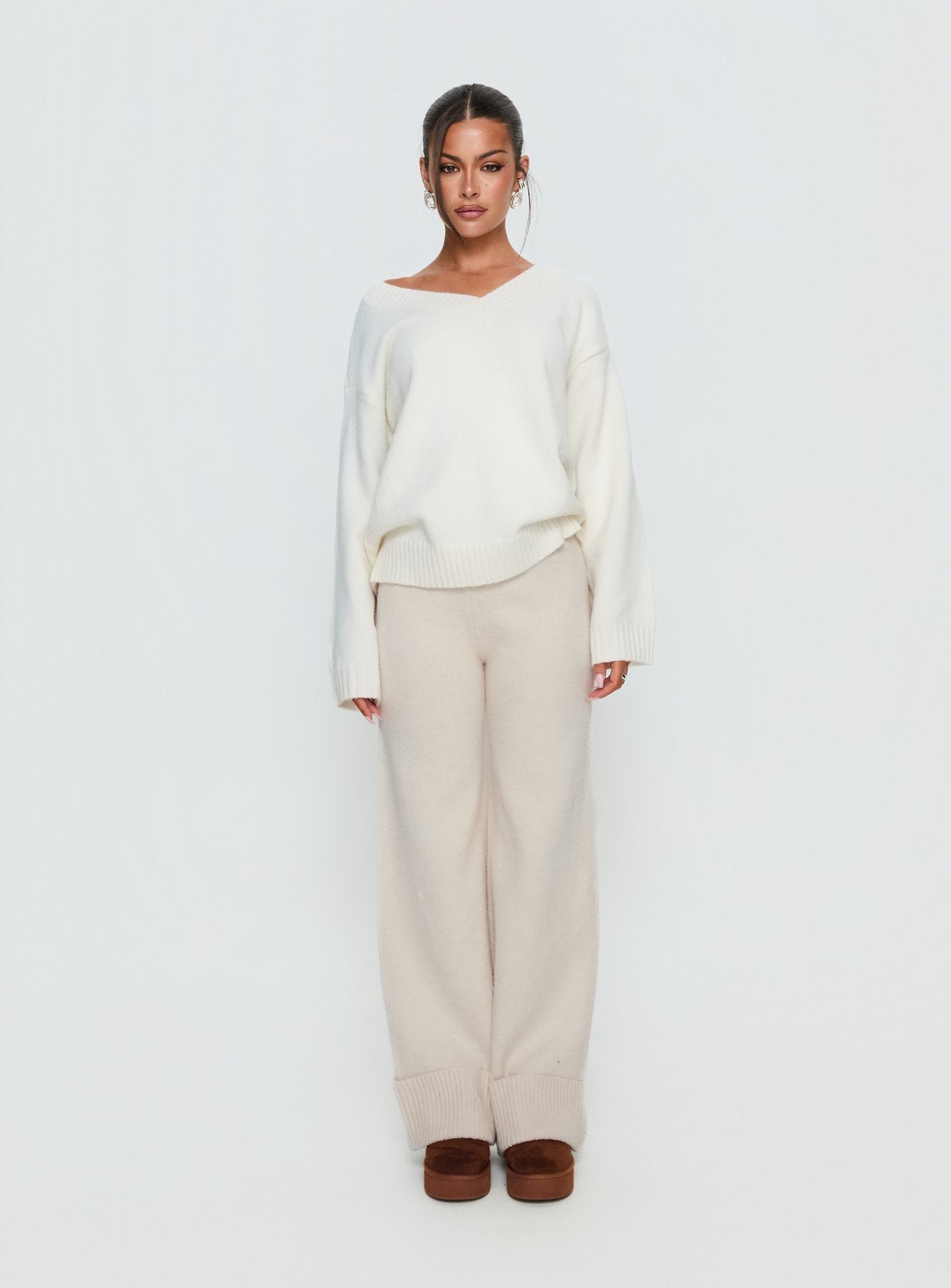 side view of model wearing Princess Polly Shinead Cuffed Pants White High Rise Pants 