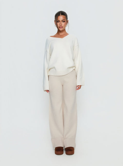 side view of model wearing Princess Polly Shinead Cuffed Pants White High Rise Pants 