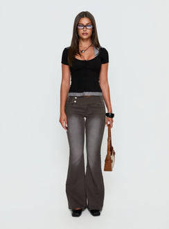 side view of model wearing Princess Polly Romea Low Waist Bootleg Jeans Dark Grey Low Rise Jeans 