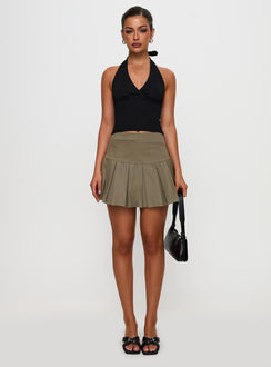   front view of model wearing Princess Polly Feodora Pleat Mini Skirt Khaki Mini Skirts 
