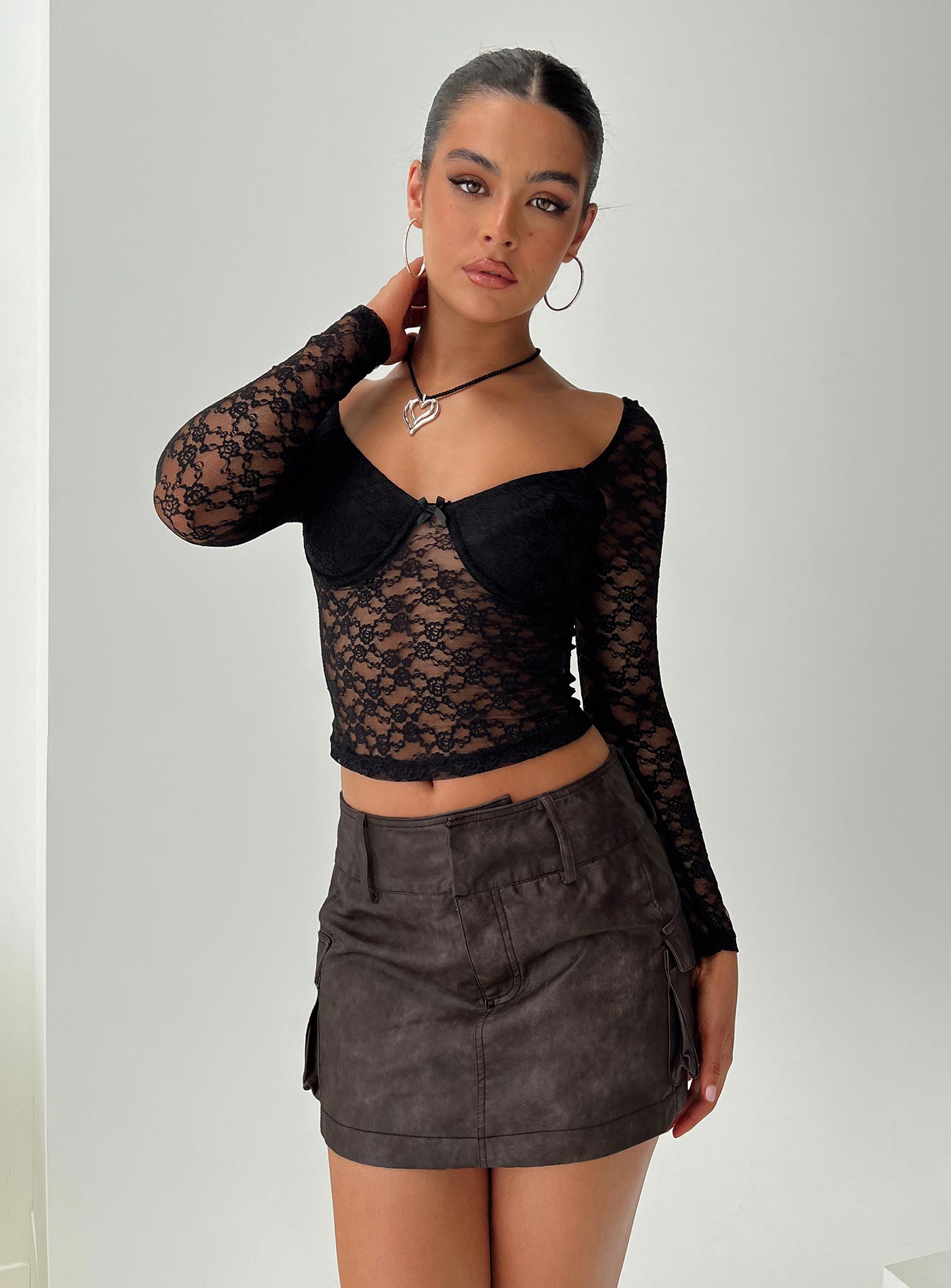   front view of model wearing Princess Polly Domenic Faux Leather Mini Skirt Washed Black Petite Mini Skirts 