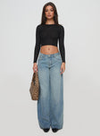 side view of model wearing Princess Polly Demie Distressed Detail Wide Leg Jean Light Wash Low Rise Jeans 