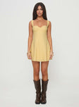 front view of model wearing Princess Polly Mcbeath Mini Dress Yellow Sweetheart Neckline 