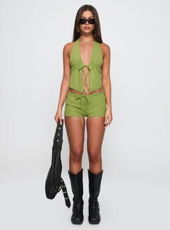 front view of model wearing Princess Polly Obviously Halter Top Green Sleeveless Plunger 