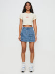 Front view of model wearing  front Chillders Denim Mini Skirt Mid Wash Tall Princess Polly  Mini Skirts 