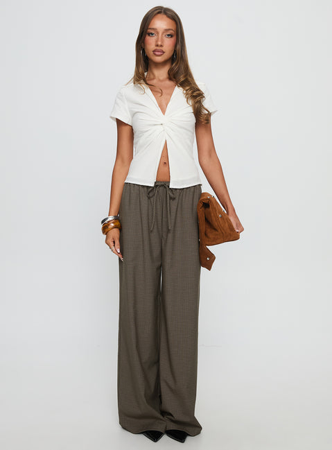 front view of model wearing Princess Polly Ketrina Tie Waist Pants Brown Plaid High Waisted Pants 