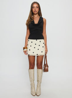   front view of model wearing Princess Polly Adelaida Ruffle Mini Skirt Cream Polka Mini Skirts 