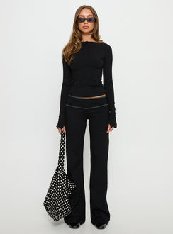 front view of model wearing Princess Polly Kobee Jersey Flare Pants Black / Grey Mid Rise Pants 