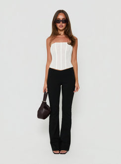Discover the Zeni V Waist Bootleg Pants Black in womens-regular-pants with mid-rise front view of model wearing