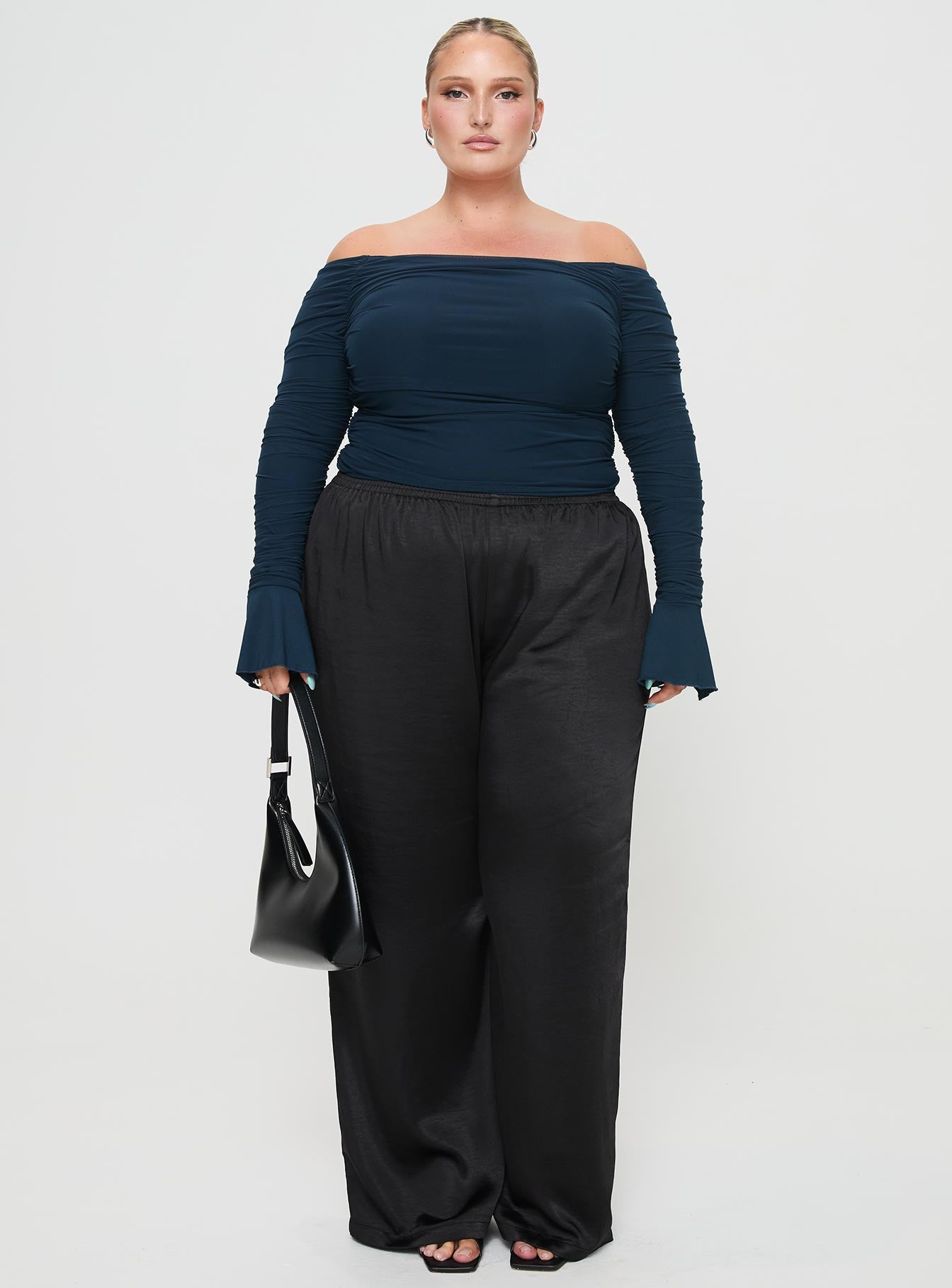 front view of model wearing Princess Polly Moreno Off The Shoulder Top Navy Curve Full Sleeves straight 