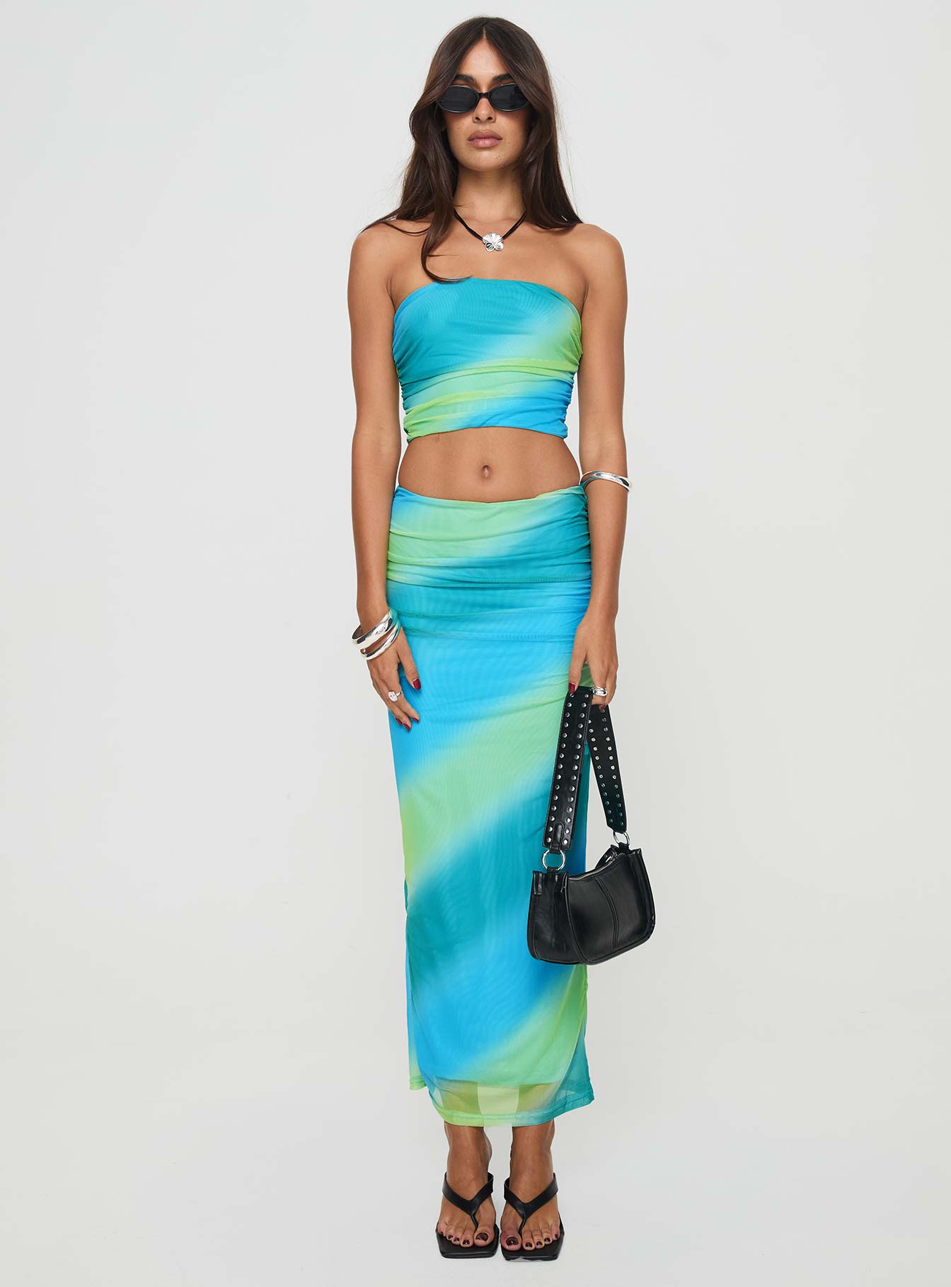 Two piece mesh set Tube top, ruched sides, inner silicone strip at bust Maxi skirt, thin elasticated waistband, ruching down sides Good stretch, fully lined