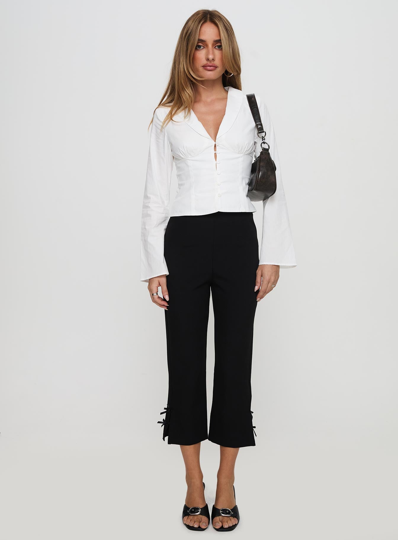 front view of model wearing Princess Polly Work Of Art Long Sleeve Top White Full Sleeves V-Neck 