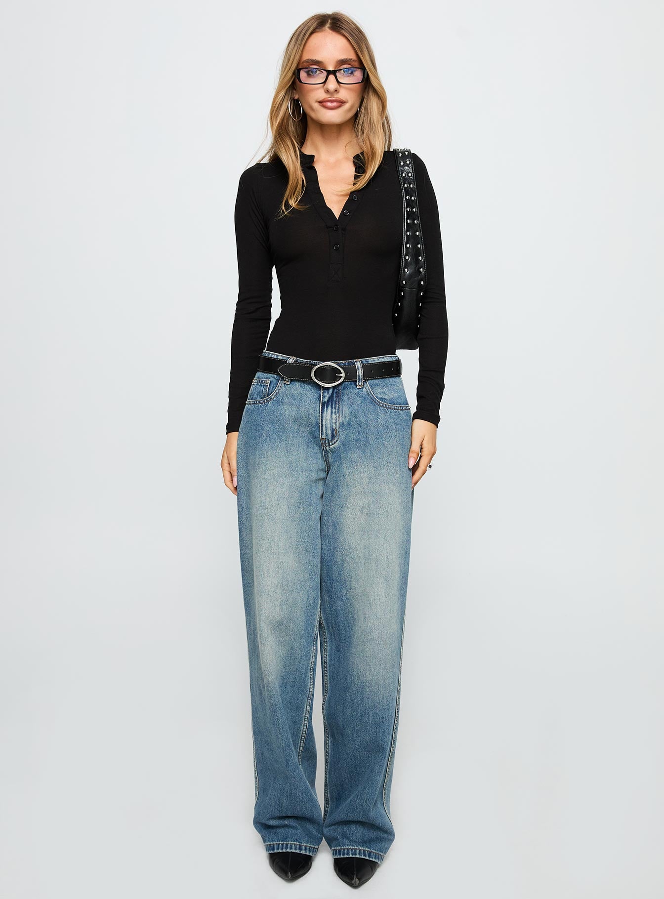 side view of model wearing Princess Polly Kandis Long Sleeve Bodysuit Black Long Sleeve Tops 