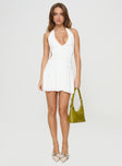 Mini dress Halter style, low open back with tie fastening, ruched detail at bust Good stretch, fully lined 