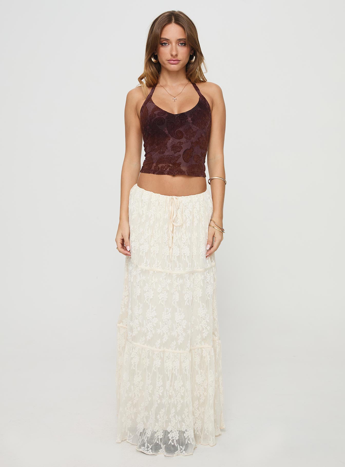   side view of model wearing Princess Polly Oh Plisse Maxi Skirt Cream Maxi 