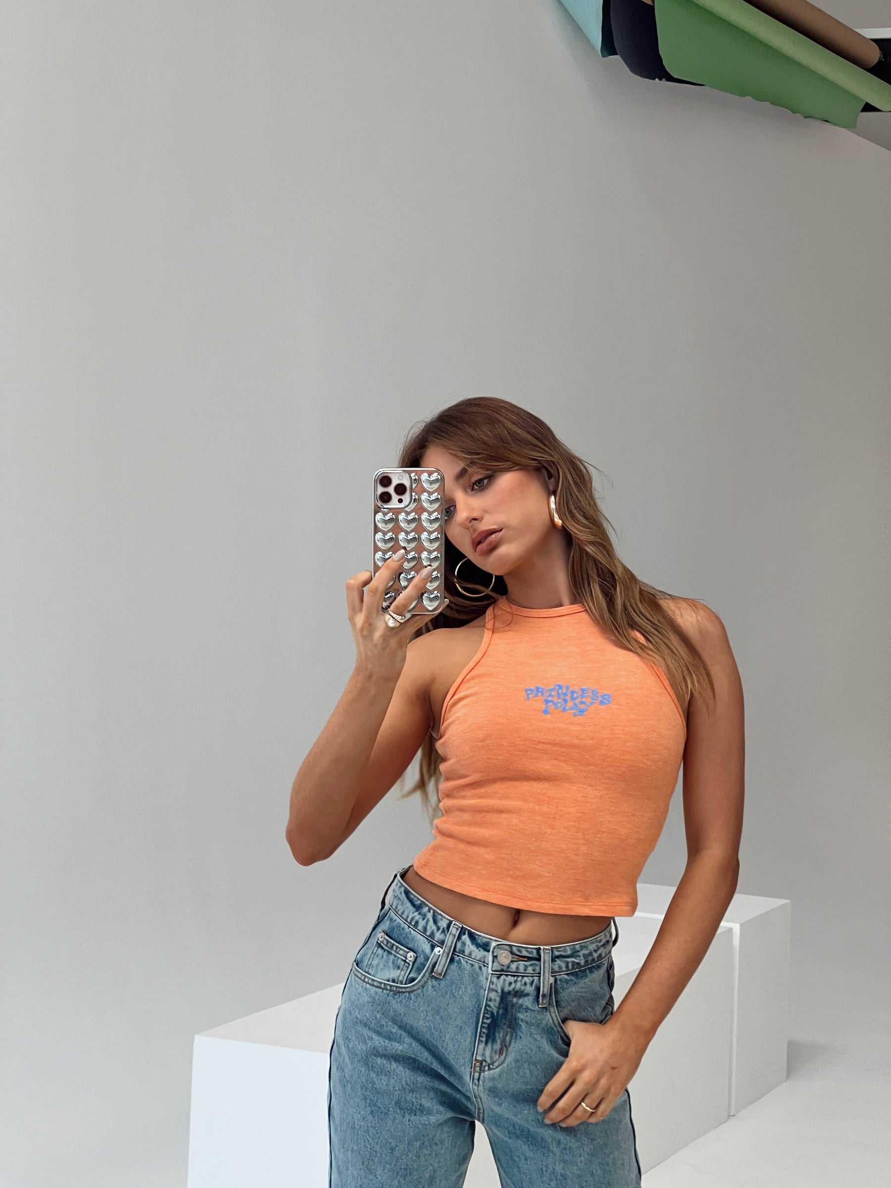 Front view of model wearing  front Princess Polly Sleeveless Square Neck  Princess Polly Bubble Tank Orange / Blue