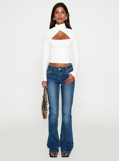 side view of model wearing Princess Polly Ganz Long Sleeve Top White Full Sleeves High Neck 