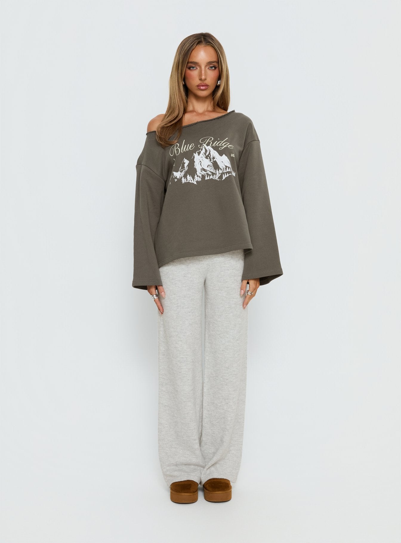 side view of model wearing Princess Polly Blue Ridge Mountains Off Shoulder Graphic Sweater Grey 