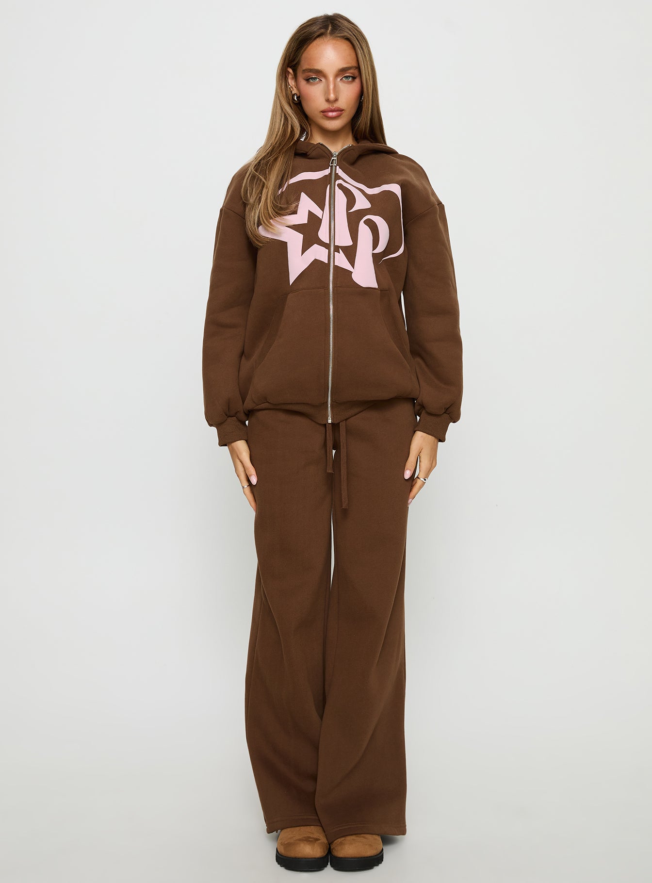 side view of model wearing Princess Polly Princess Polly Stargirl Zip Through Jumper Brown Longline Jumpers 