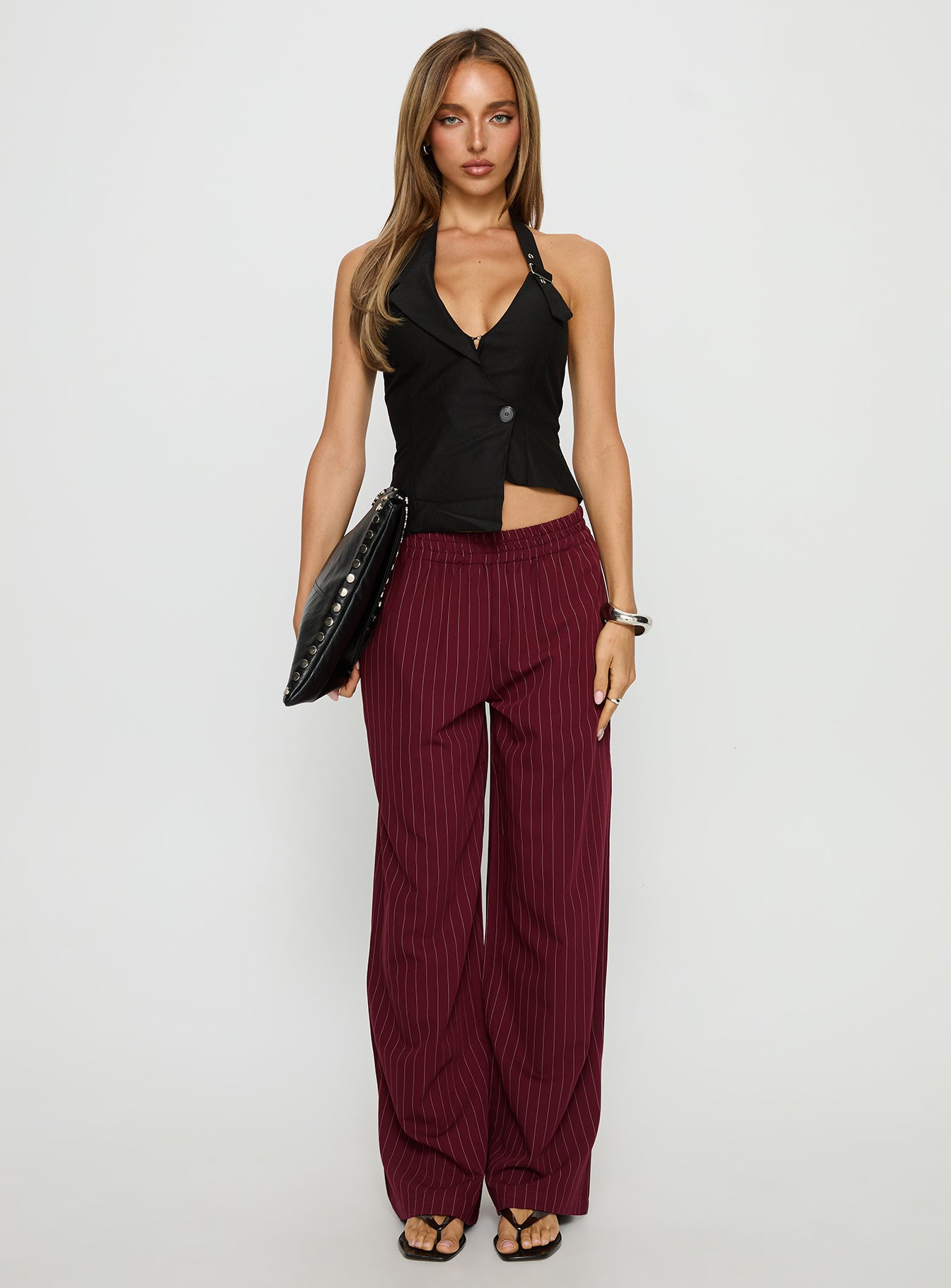 front view of model wearing Princess Polly Jaysa Baggy Wide Leg Pant Burgundy Pinstripe Mid Rise Pants 