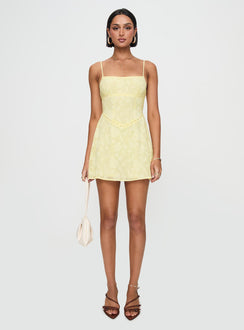 front view of model wearing Princess Polly South Of France Mini Dress Yellow Petite Square Neck 