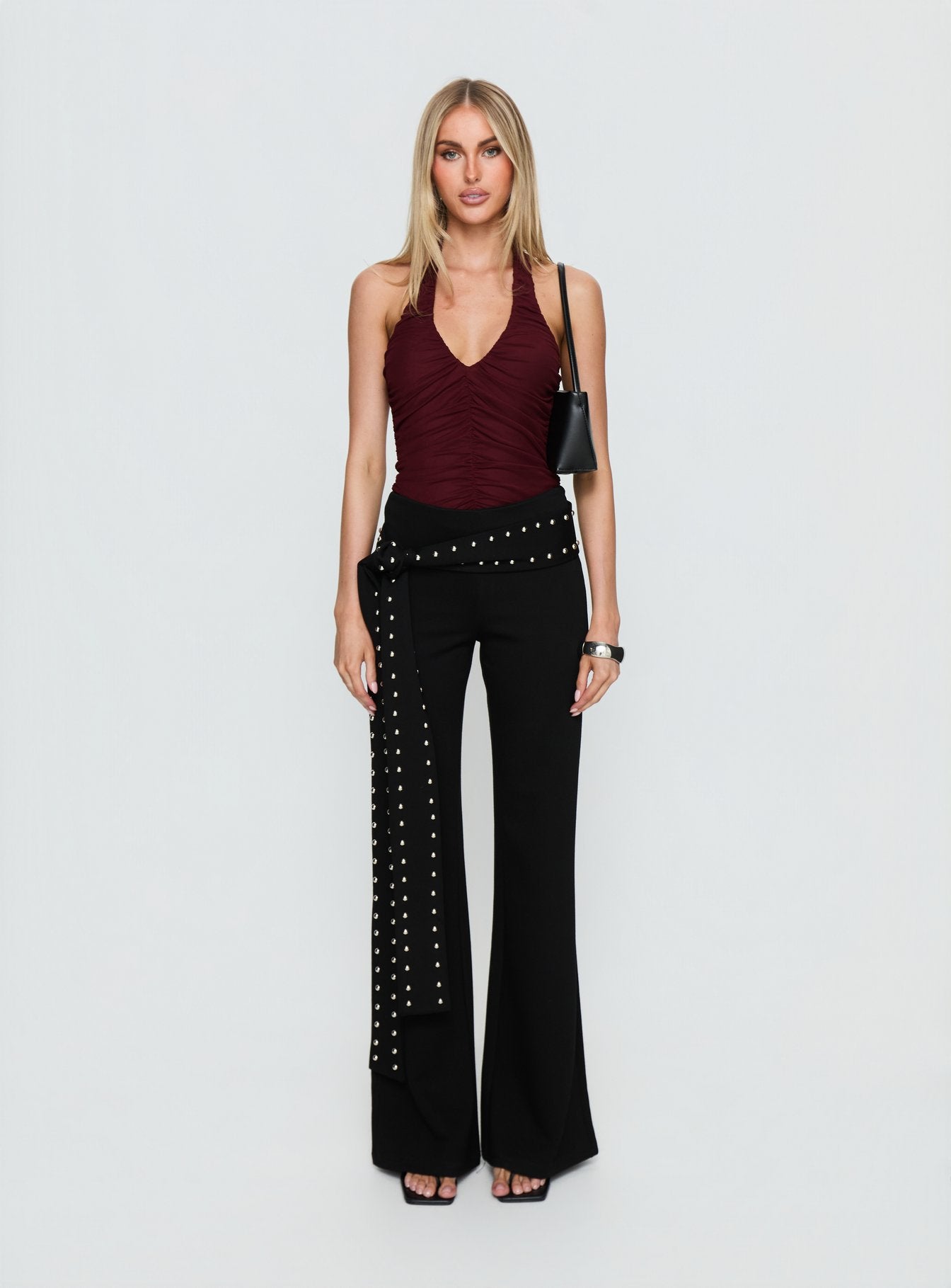 side view of model wearing Princess Polly Eye Candy Ruched Bodysuit Burgundy Sleeveless 