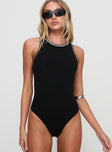 front view of model wearing Princess Polly Pietra Bodysuit Black Sleeveless 