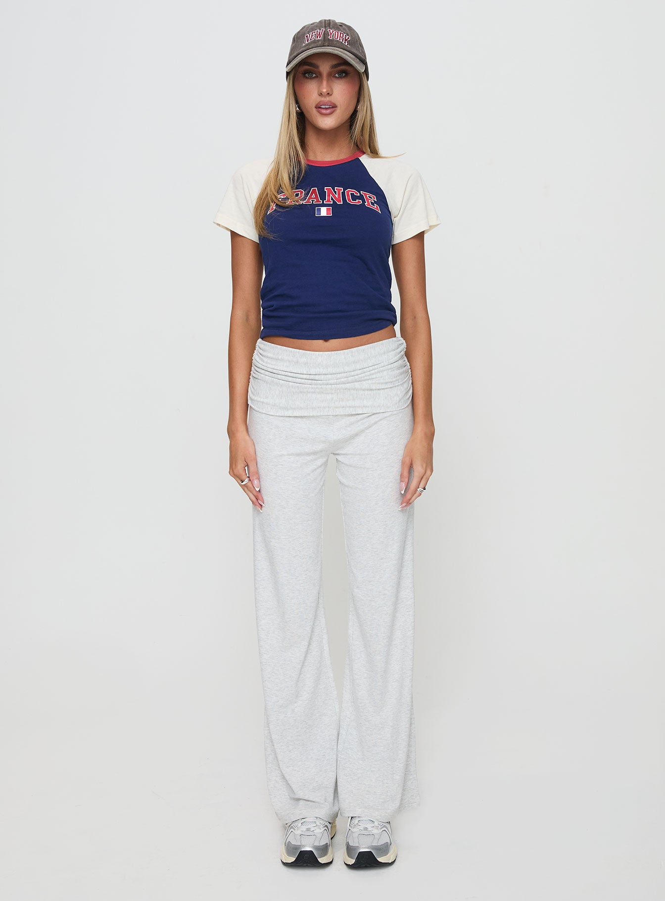 side view of model wearing Princess Polly France Fantasy Top Navy Short Sleeves Crew Neck 