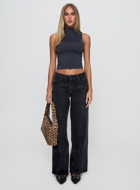 front view of model wearing Princess Polly Serenitia Mid Rise Relaxed Jeans Washed Black Tall Mid Rise 