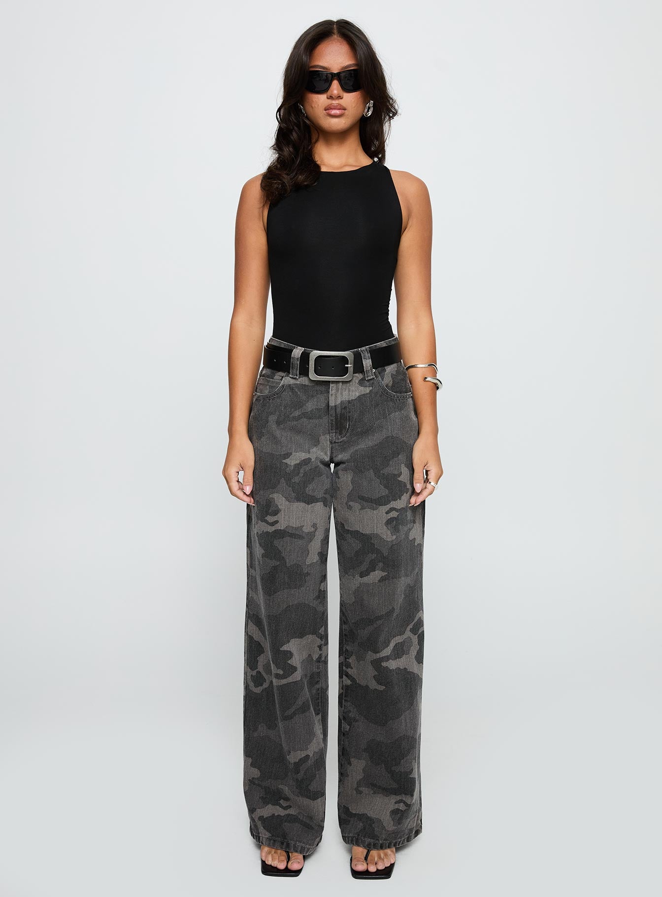 front view of model wearing Princess Polly Majesty Tie Back Bodysuit Black Sleeveless 