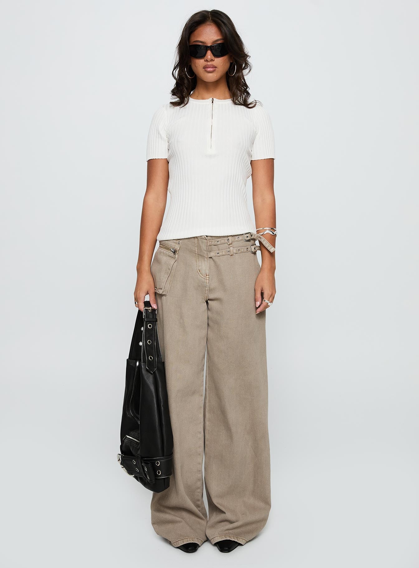 side view of model wearing Princess Polly Hold The Line Zip Through Top White Short Sleeves Crew Neck 