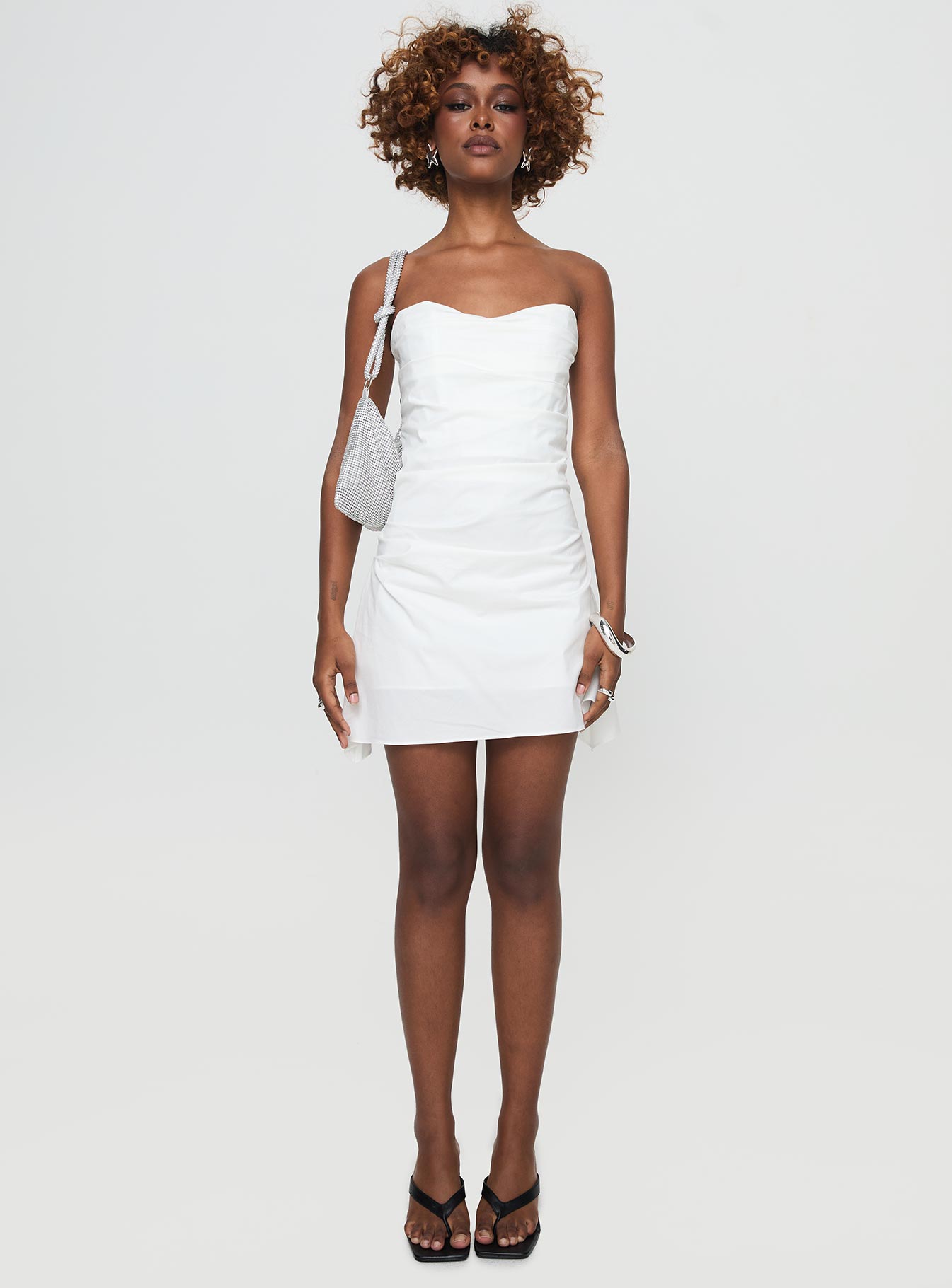 front view of model wearing Princess Polly Bradwell Strapless Mini Dress White Sweetheart Neckline 