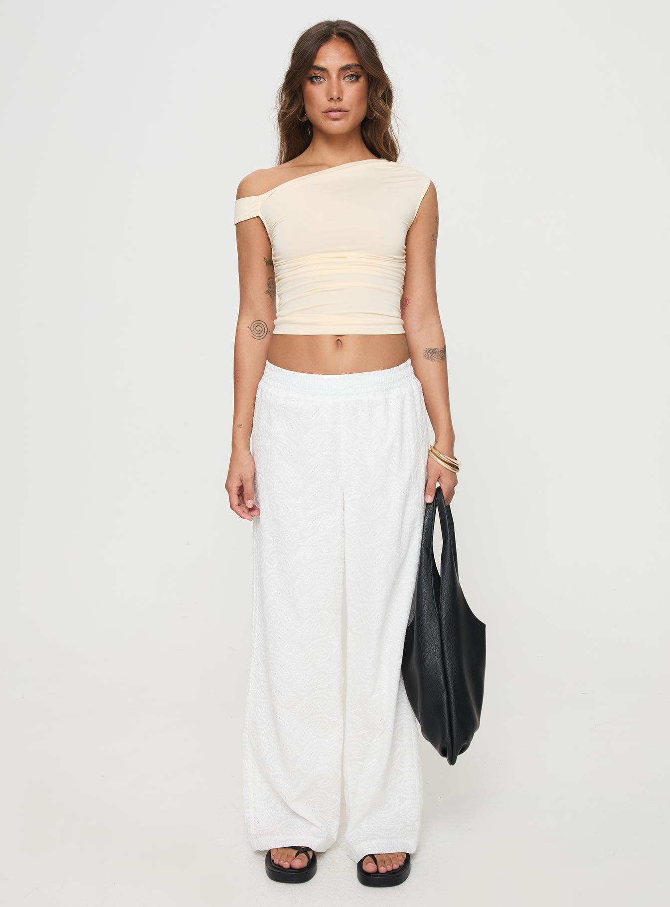 front view of model wearing Princess Polly Unfair Pants White Mid Rise 