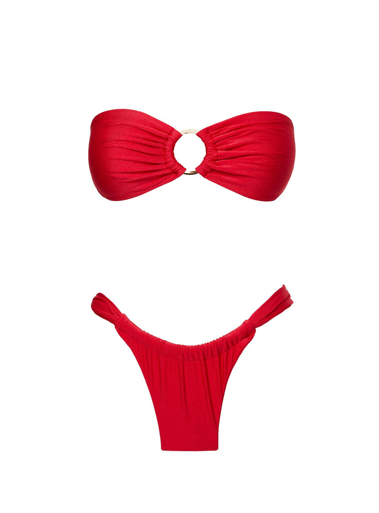 A young woman wearing a red top, bikini … – Buy image – 12480813