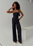 Strapless jumpsuit Inner silicone strip at bust, invisible zip fastening, fold at bust, straight leg fit Non-stretch material, unlined 