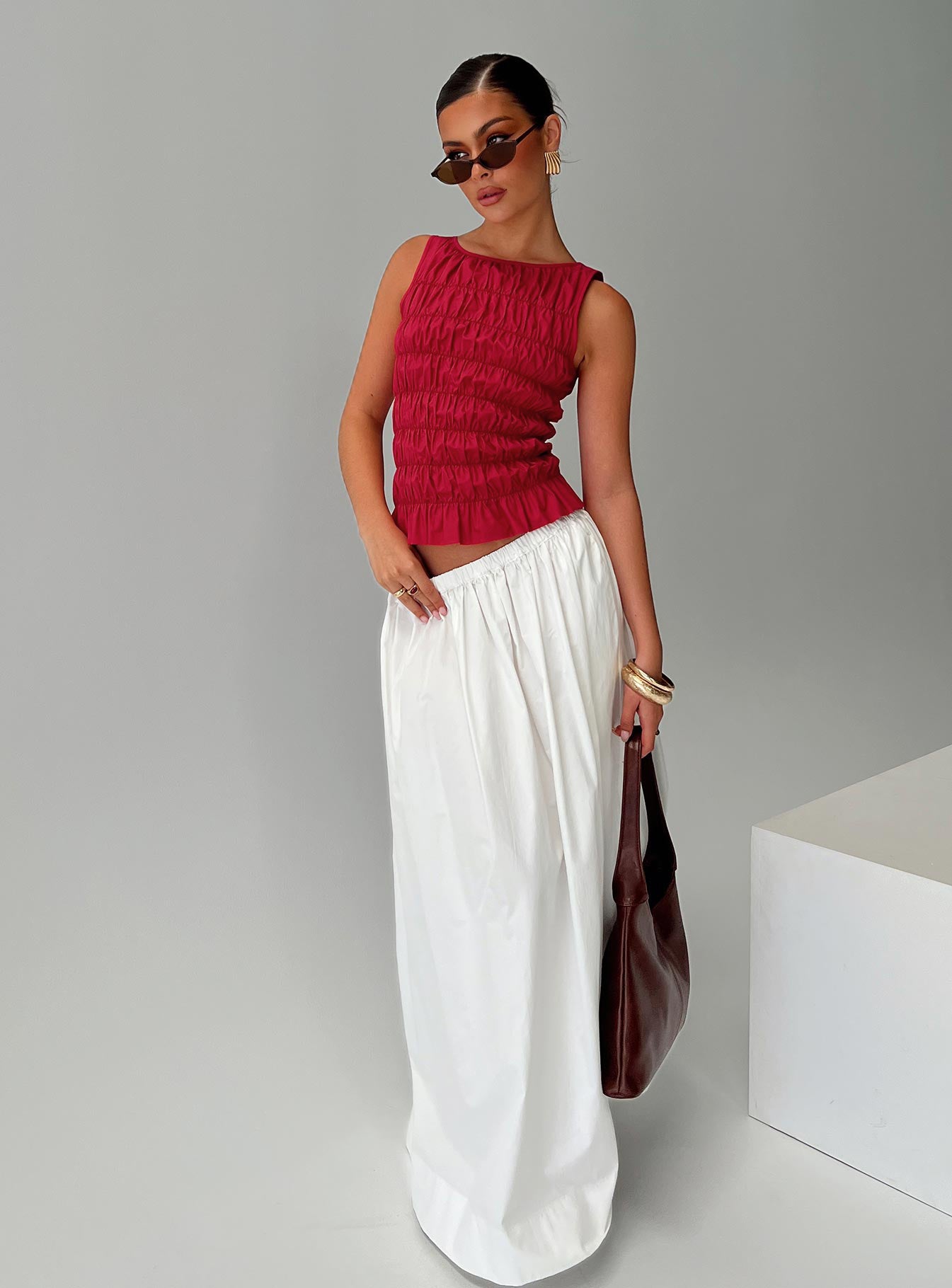   side view of model wearing Princess Polly Felipa Maxi Skirt White Maxi 