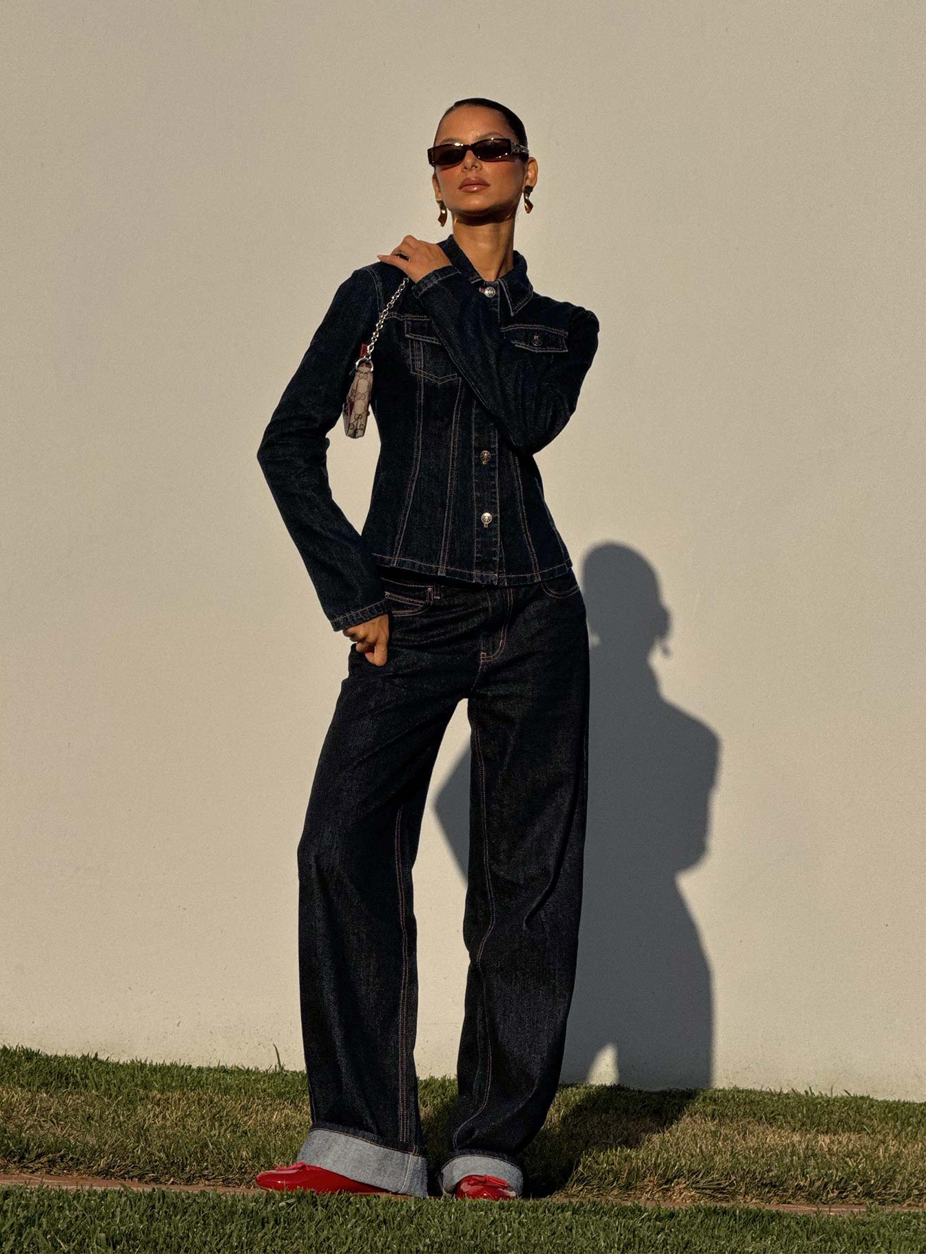 side view of model wearing Princess Polly Top Model Cuffed Jean Dark Denim Mid Rise 