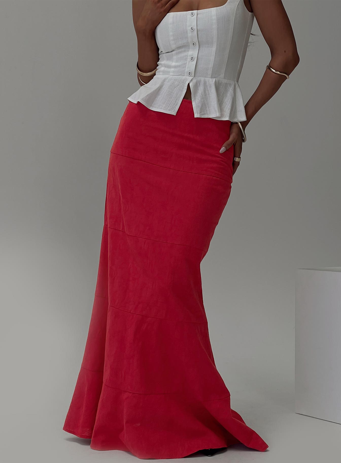 back view of model wearing Princess Polly Raven Mid Rise Maxi Skirt Red Maxi 