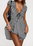 Black and white Gingham romper Puff sleeve, deep v neckline, shirred material, invisible zip fastening down back