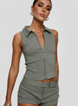 Low rise shorts Zip fastening, fixed belt detail with silver-toned buckle fastening Good stretch, unlined 
