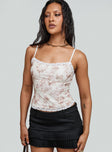 front view of model wearing Princess Polly Zachariah Cami Top White Floral Sleeveless Square Neck 