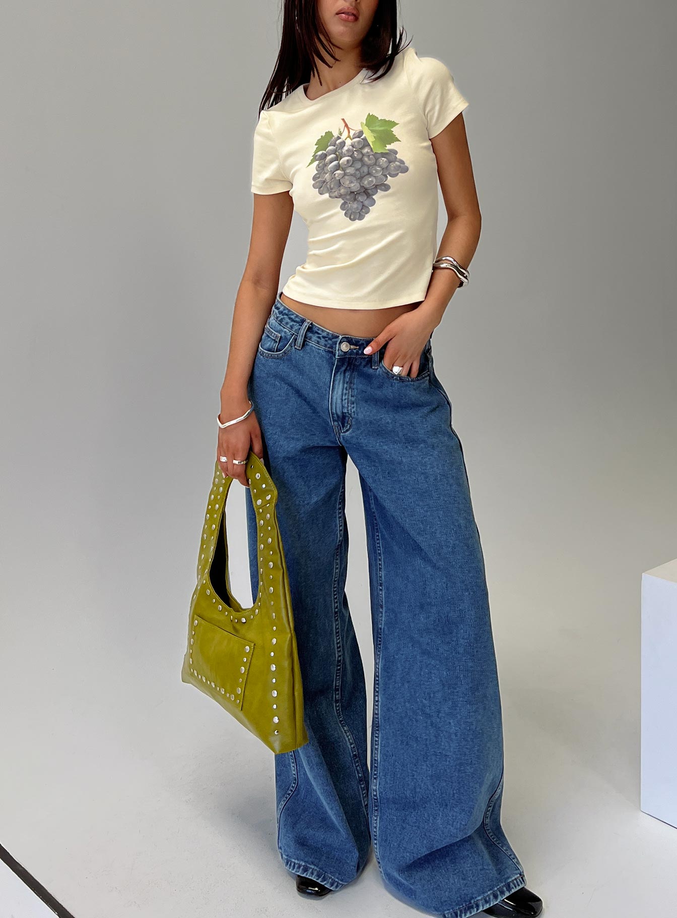 front view of model wearing Princess Polly Grapejuice Graphic Top Cream Short Sleeves Crew Neck 