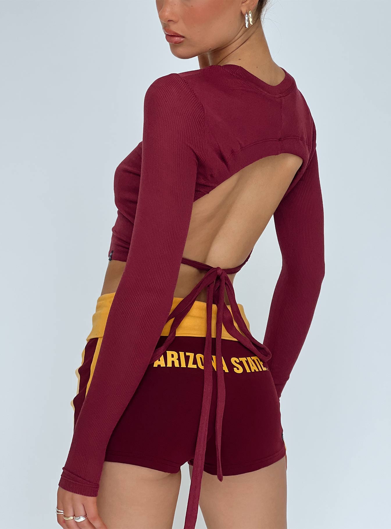 back view of model wearing Princess Polly ASU Bring It Back Top Maroon Full Sleeves Crew Neck 