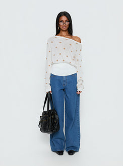 side view of model wearing Princess Polly Harvy Off Shoulder Knit Sweater White Polka regular 