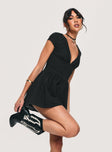 Black Playsuit V neckline, invisible zip fastening at back, pleats at waist, cap sleeve