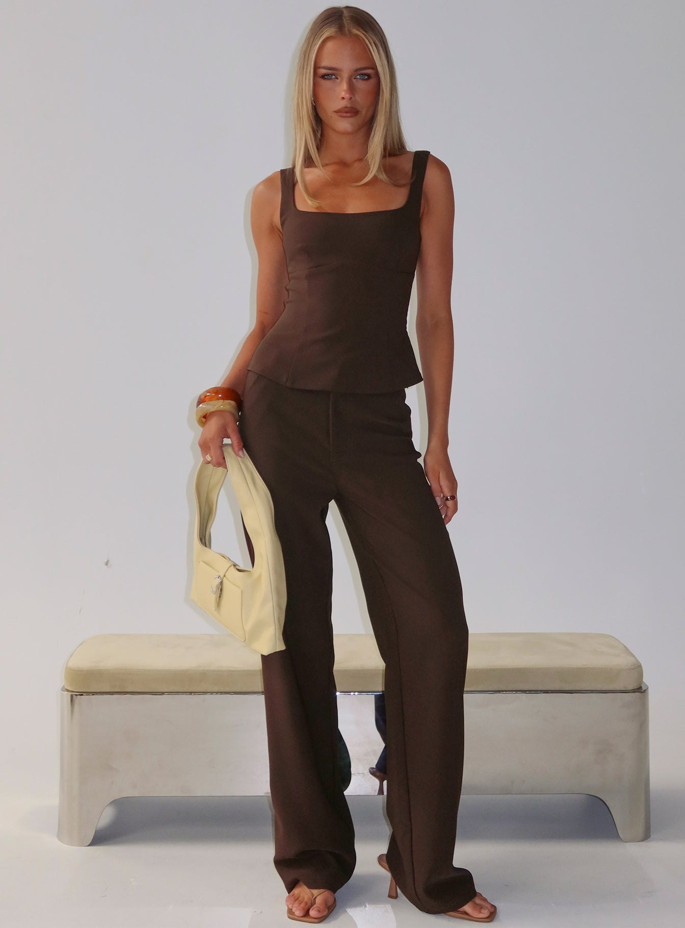 front view of model wearing Princess Polly Kinsie Tailored Pants Brown High Rise Pants 