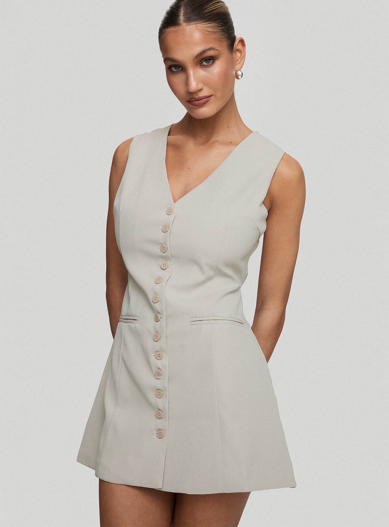 side view of model wearing Princess Polly Katja Mini Dress Oyster V-Neck 