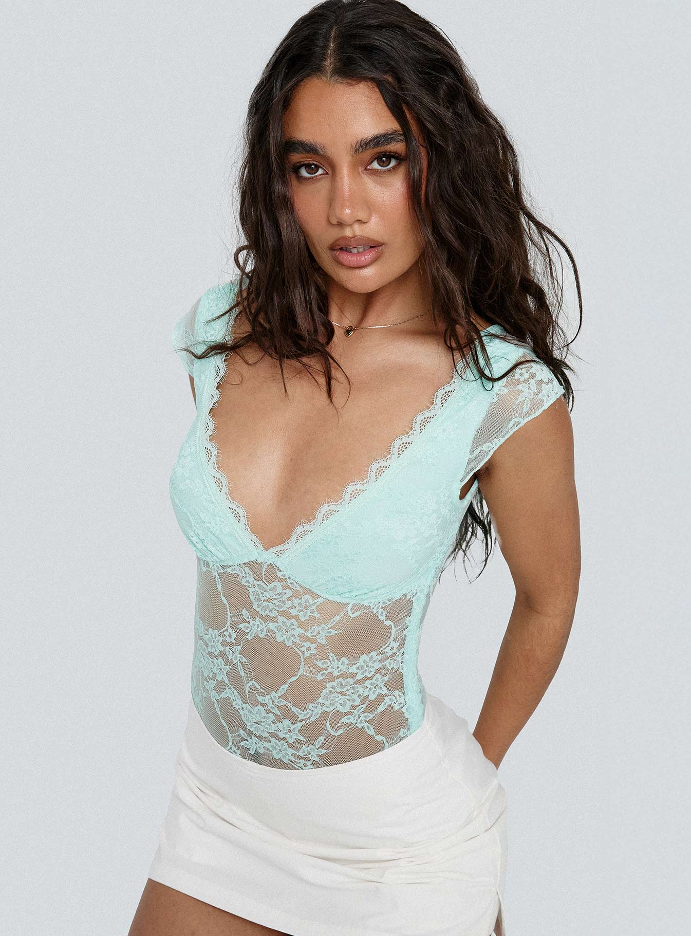 side view of model wearing Princess Polly Tantalize Bodysuit Blue Short Sleeve 